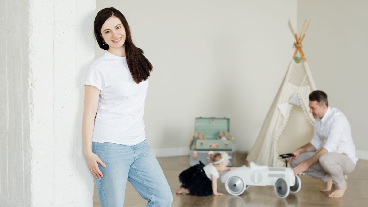 A happy family enjoying quality time together indoors, showcasing contemporary lifestyle and parenting moments.